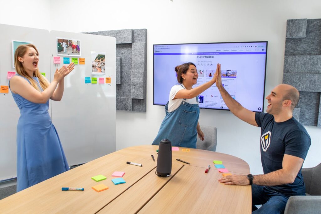 Team members celebrating in the office